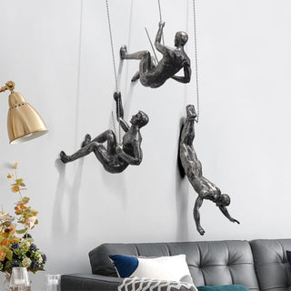 Climber Wall Sculpture, falling climber