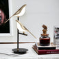 Golden Bird Wall Light – in a room setting