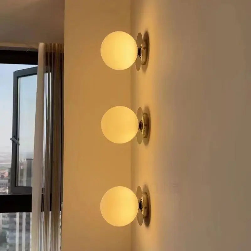 Glass Globe Wall Light – in a room setting