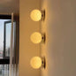 Glass Globe Wall Light – in a room setting
