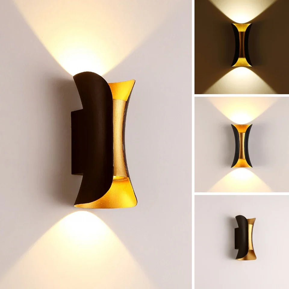 Black and Gold Up and Down Wall Light – in a room setting